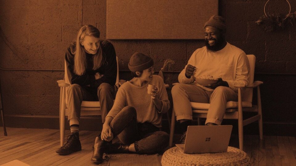 young adults laughing together.