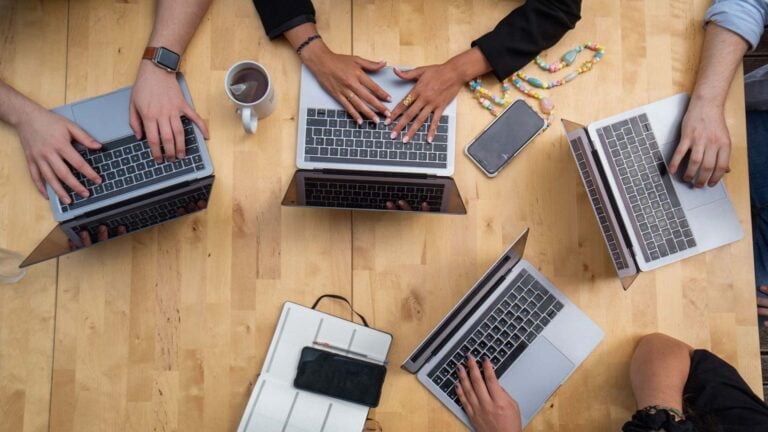 group photo showing laptop computers.